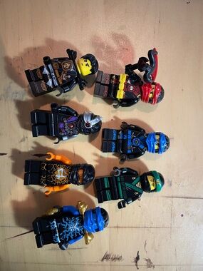 Lego Ninjago Minifigures in Black, Blue, Red, Green, Orange, Gold